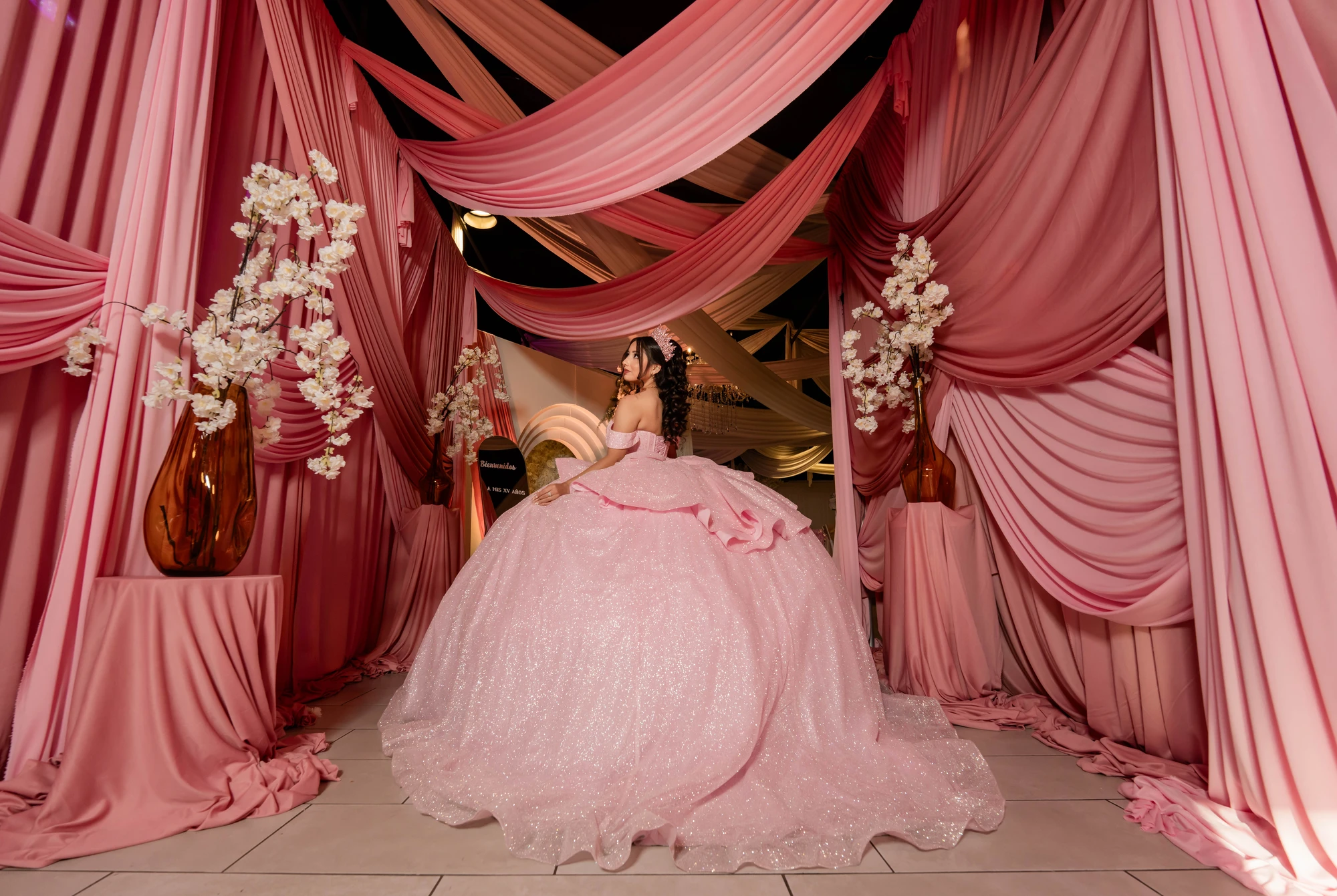 Special celebration with red and gold themed decor at La Bella Luna Venue Pflugerville